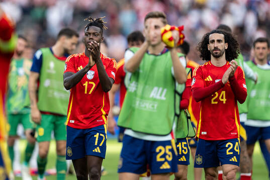 Nicholas Williams and Marc Cucurella of Spain