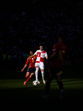 Daniel Carvajal of Spain and Ivan Perisic of Croatia