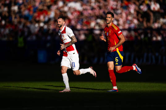 Marcelo Brozovic of Croatia and Mikel Merino of Spain