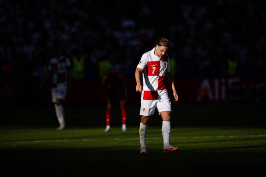 Lovro Majer of Croatia looks dejected