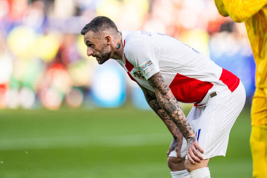 Marcelo Brozovic of Croatia looks dejected