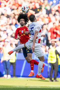 Marc Cucurella of Spain and Ante Budimir of Croatia