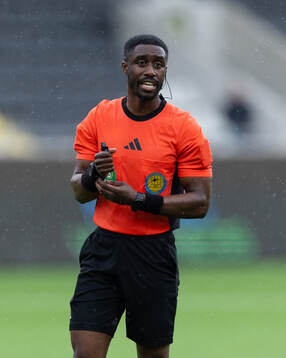 Domare Fredrik Oppong