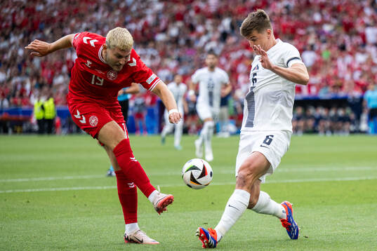 Jonas Wind of Denmark and Jaka Bijol of Slovenia
