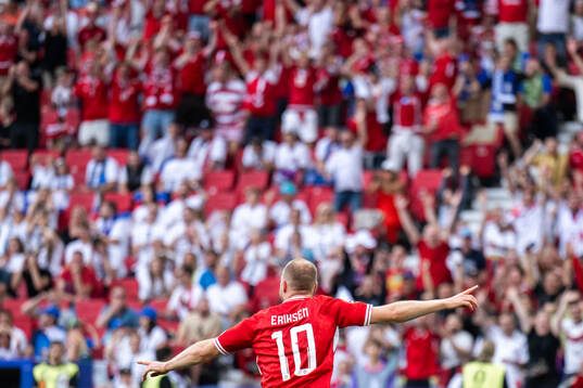 Christian Eriksen of Denmark celebrates