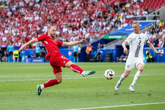 Christian Eriksen of Denmark scores 0-1 behind Zan