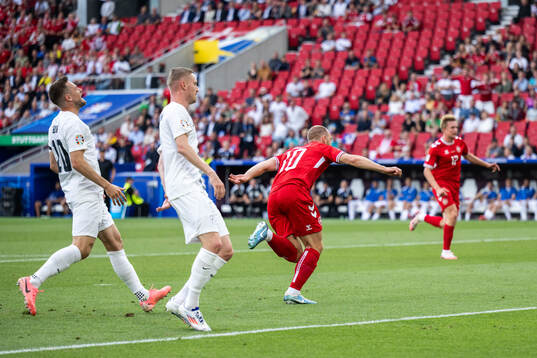 Christian Eriksen of Denmark celebrates