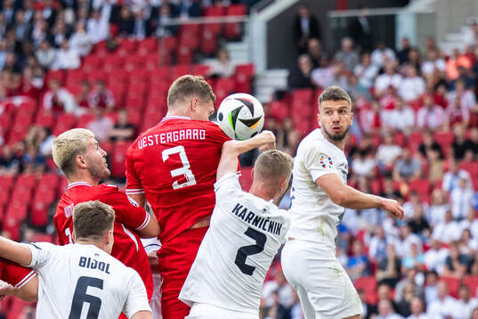 Jonas Wind and Jannik Vestergaard of Denmark against Zan