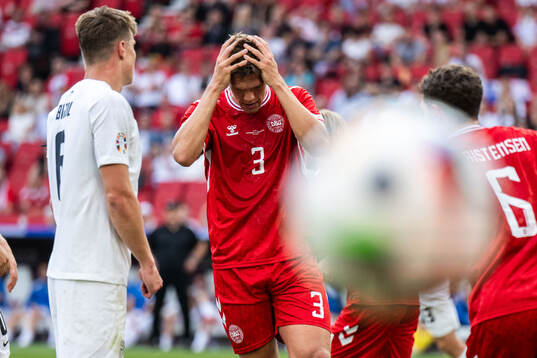 Jannik Vestergaard of Denmark looks dejected