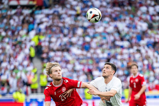 Morten Hjulmand of Denmark and Erik Janza of Slovenia