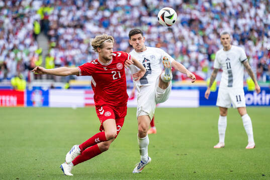 Morten Hjulmand of Denmark and Erik Janza of Slovenia