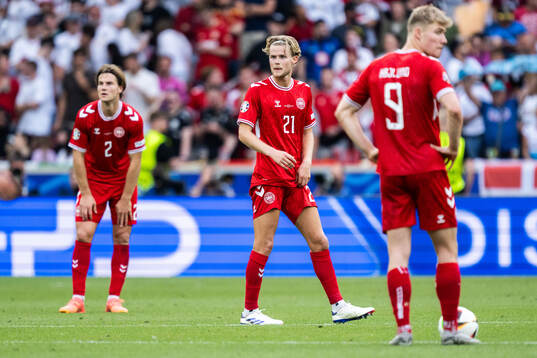 Morten Hjulmand of Denmark looks dejected