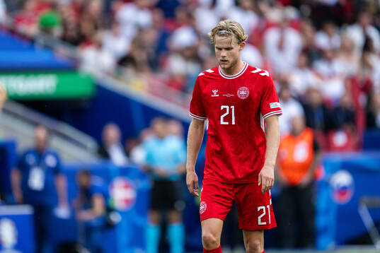 Morten Hjulmand of Denmark looks dejected