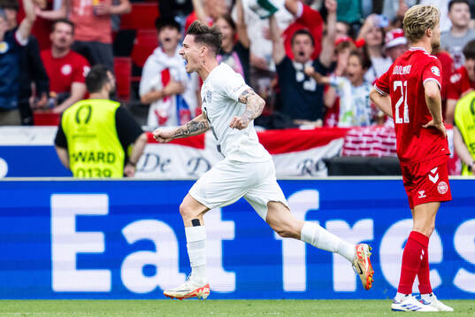 Benjamin Verbic of Slovenia celebrates