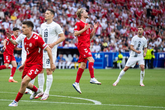 Morten Hjulmand of Denmark looks dejected