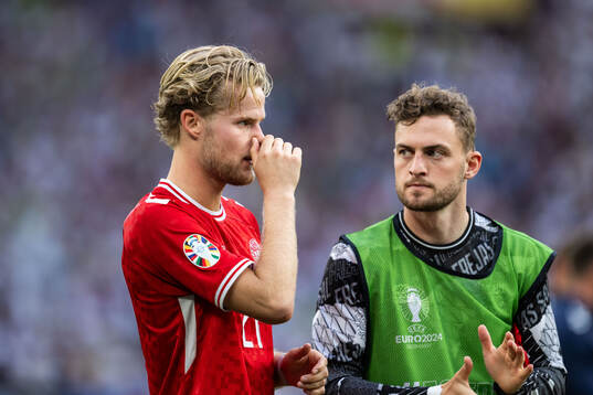 Morten Hjulmand of Denmark looks dejected