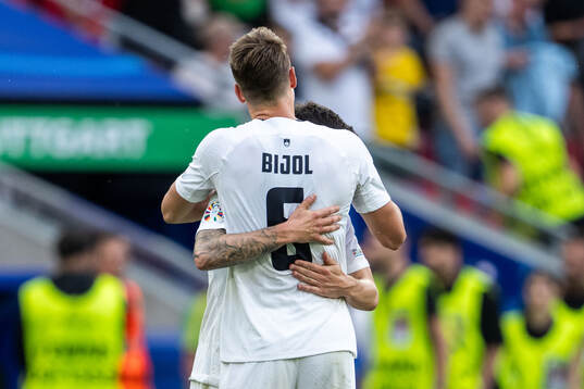 Erik Janza and Jaka Bijol of Slovenia celebrate