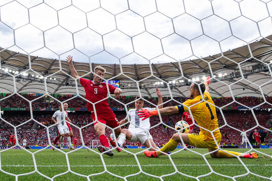 Rasmus Højlund of Denmark against Jaka Bijol and