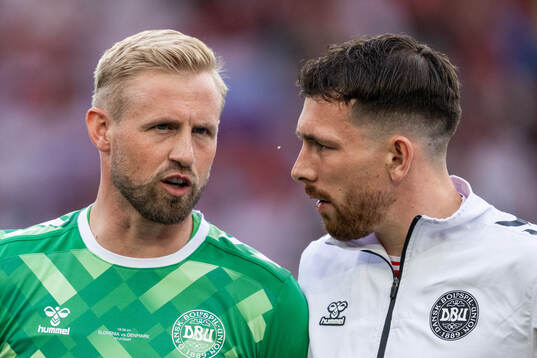 Goalkeeper Kasper Schmeichel and Pierre-Emil Højberg of