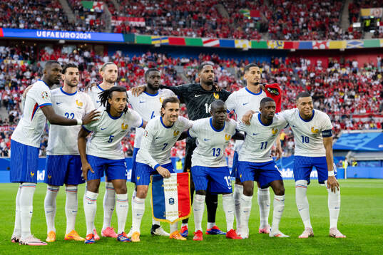The starting eleven of France pose for a team photo