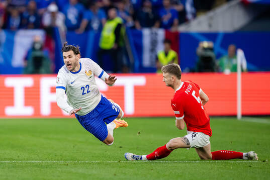 Theo Hernandez of France and Stefan Posch of Austria