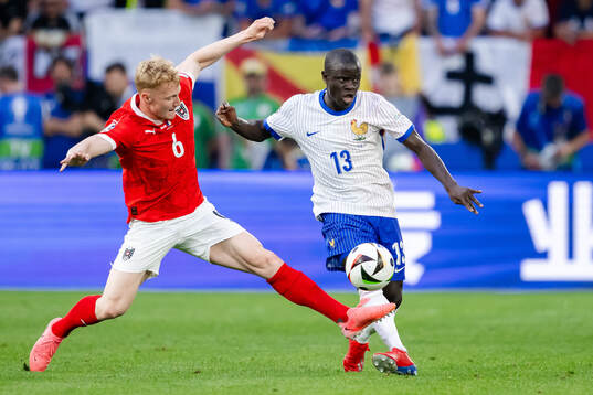 Nicolas Seiwald of Austria and N'Golo Kanté of France