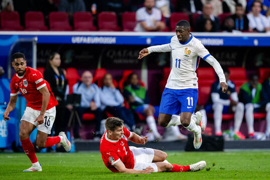Maximilian Wöber of Austria and Ousmane Dembele of France