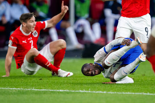 Ousmane Dembele of France in pain