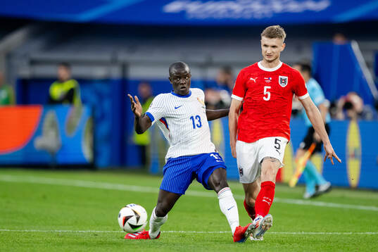 N'Golo Kanté of France and Stefan Posch of Austria