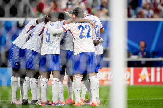 Players of France celebrate the 0-1 goal