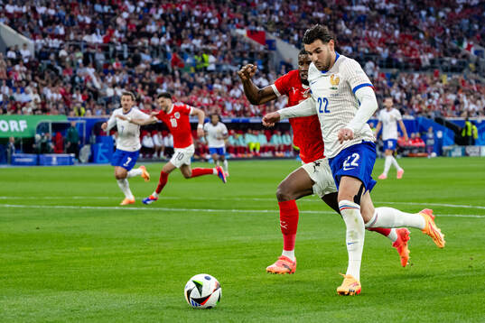 Kevin Danso of Austria and Theo Hernandez of France