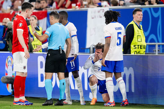 Antoine Griezmann of France in pain