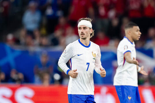Antoine Griezmann of France in pain
