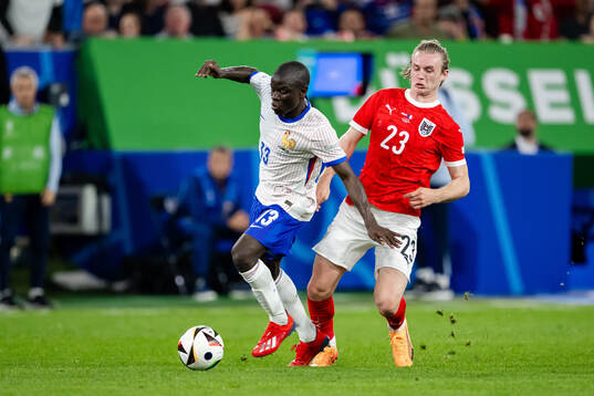 N'Golo Kanté of France and Patrick Wimmer of Austria