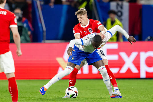 Randal Kolo Muani of France and Alexander Prass of Austria