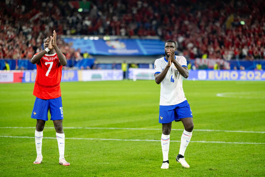Marcus Thuram and Dayot Upamecano of France celebrate