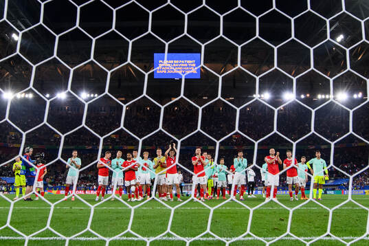 Players of Austria look dejected