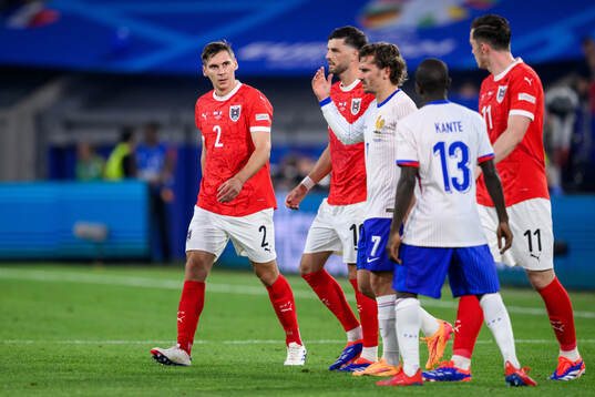 Maximilian Wöber of Austria and Antoine Griezmann of France