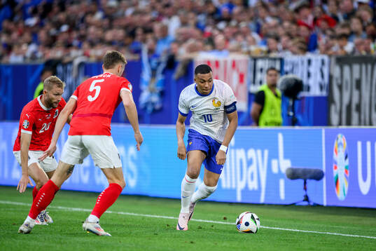 Konrad Laimer and Stefan Posch of Austria against Kylian