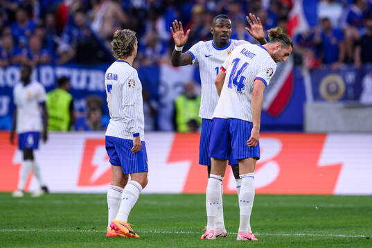 Antoine Griezmann, Marcus Thuram and Adrien Rabiot of France
