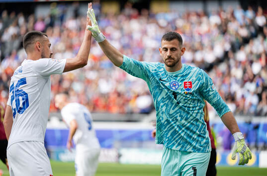 Ivan Schranz and goalkeeper Martin Dubravka of Slovakia
