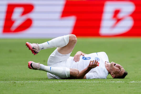 Robert Bozenik of Slovakia in pain