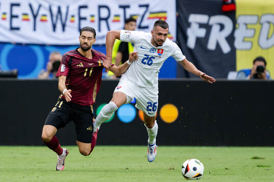 Yannick Carrasco of Belgium and Ivan Schranz of Slovakia