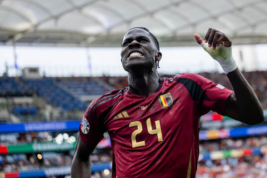 Amadou Onana of Belgium celebrates a goal that was later