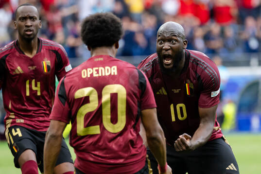 Ikoma-Lois Openda and Romelu Lukaku of Belgium celebrate a