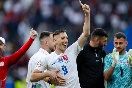 Robert Bozenik of Slovakia celebrates