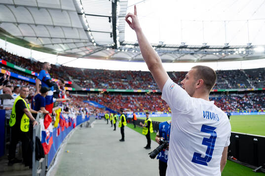 Denis Vavro of Slovakia celebrates