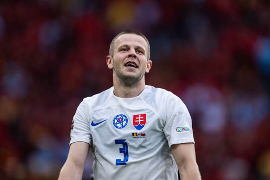 Denis Vavro of Slovakia celebrates