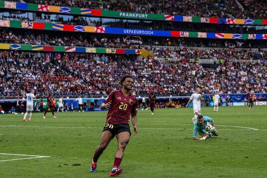 Ikoma-Lois Openda of Belgium looks dejected
