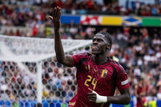 Amadou Onana of Belgium celebrates a goal that was later